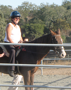Molly enjoys riding Niggy, a friendly horse.